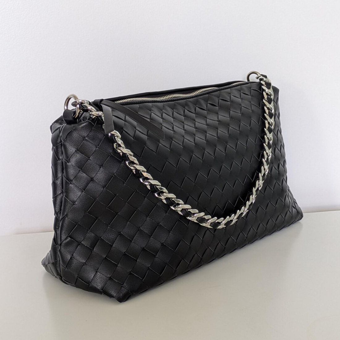 Black Grid Woven Rectangular Slouch Pouch With Full Top Zip, Mixed Metal Link Strand And Wide Flat Hanging Fitting