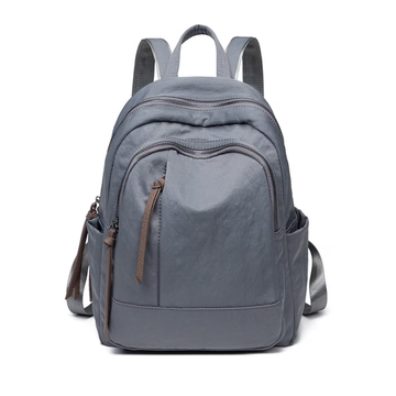 Rounded Multi-Zip Backpack With Neutral Tassel Pulls, Side Slip Pockets And Integrated Top Carry Loop