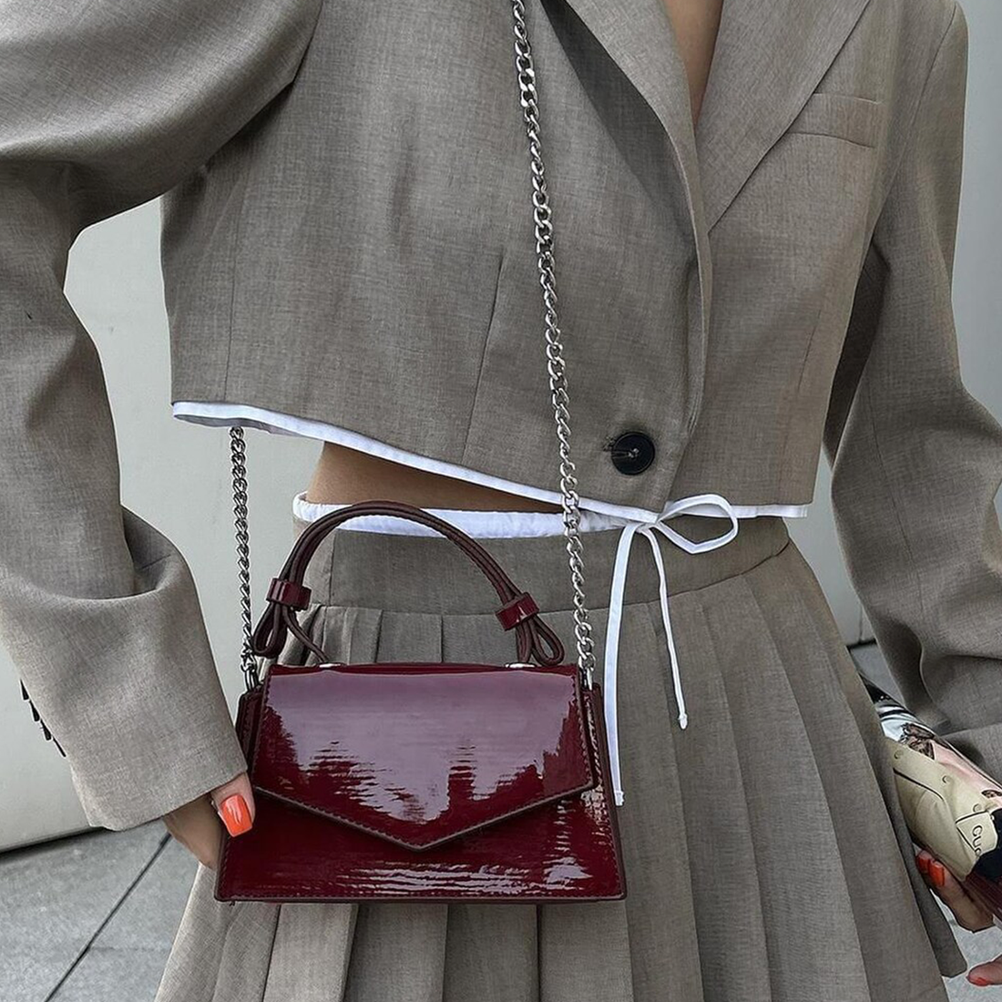 Glossy Burgundy Compact Envelope Mini Pouch With Curved Hand Tabs And Polished Silver Metal Link Strand
