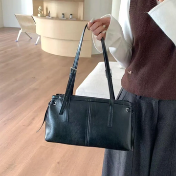 Dual Gloss Tone Streamlined Rectangular Underarm Pouch With Dual Vertical Stitch Tabs, Drawstring Tassel Details And Metallic Buckle Grip Strips